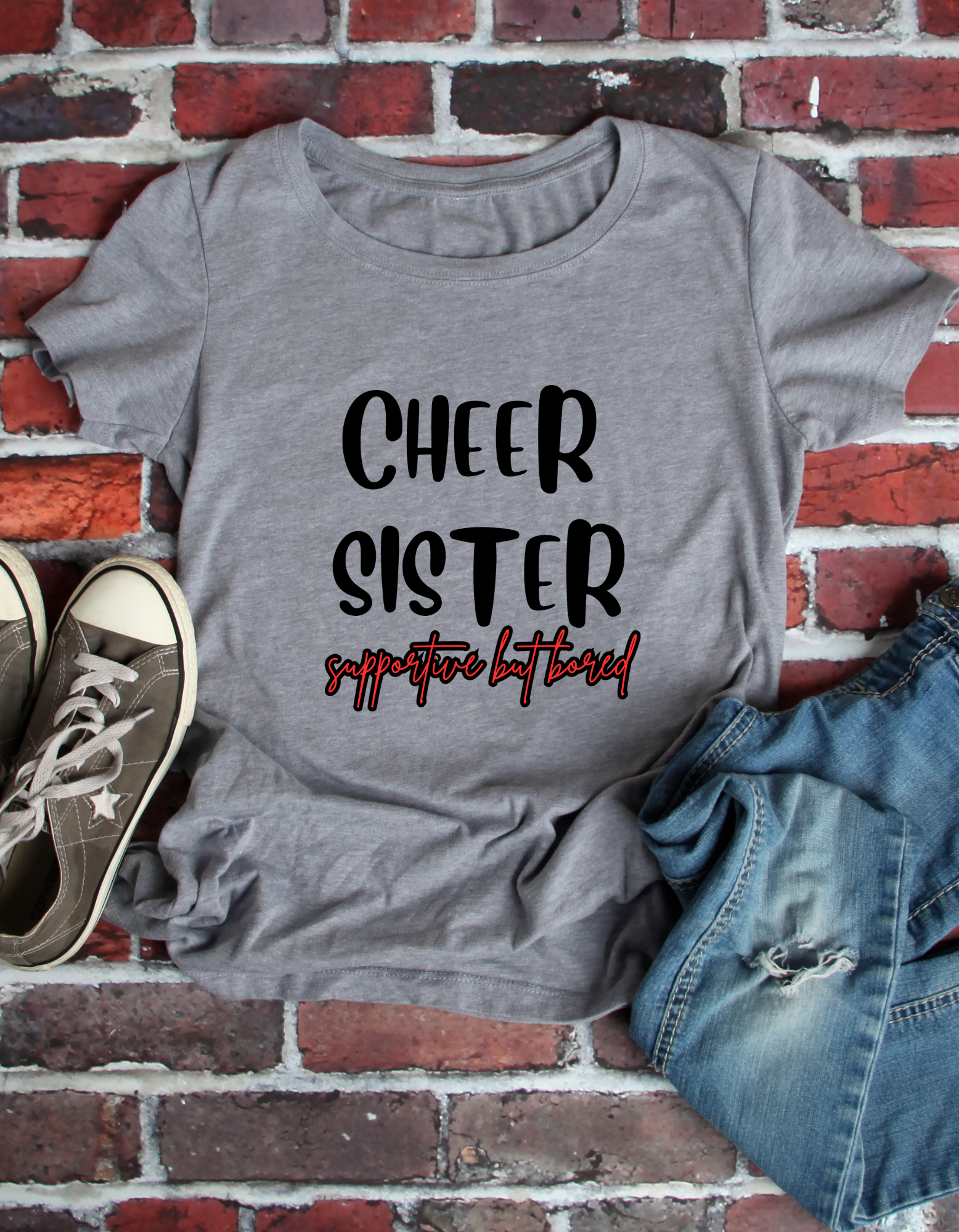 Cheer sister- supportive but bored image 2